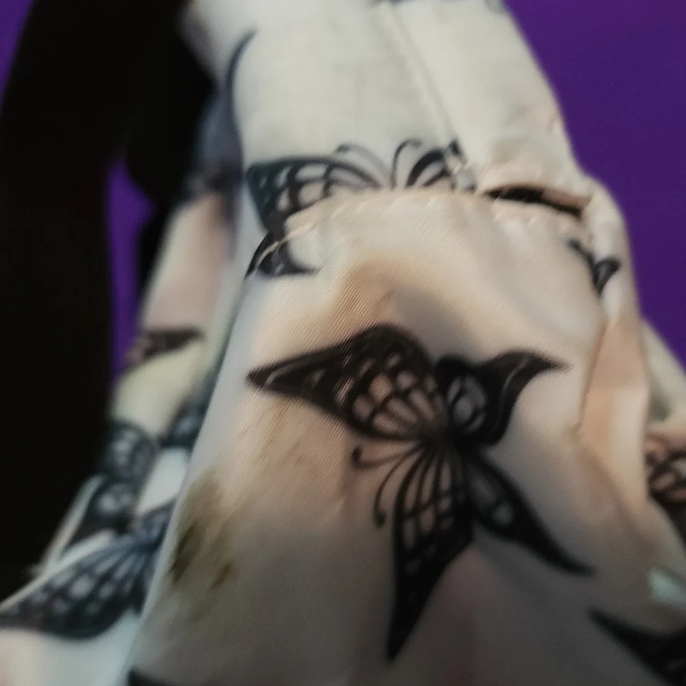 Black and white butterfly backpack